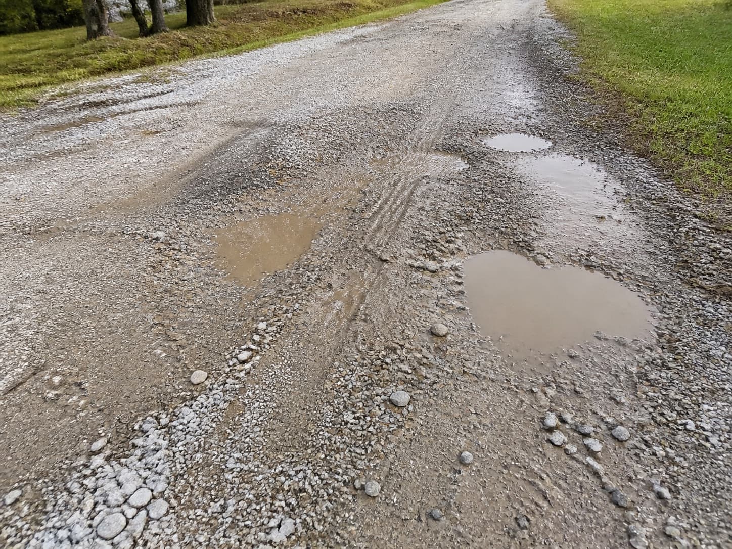 Sloped driveway runoff on a gravel driveway